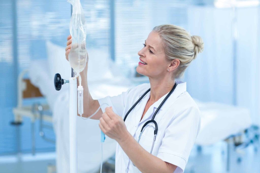 Medical Professional Checking IV Bag