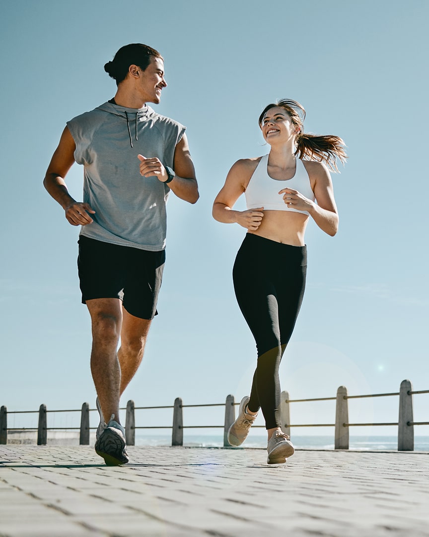 Couple Jogging on Seaside Couple Jogging on Seaside
